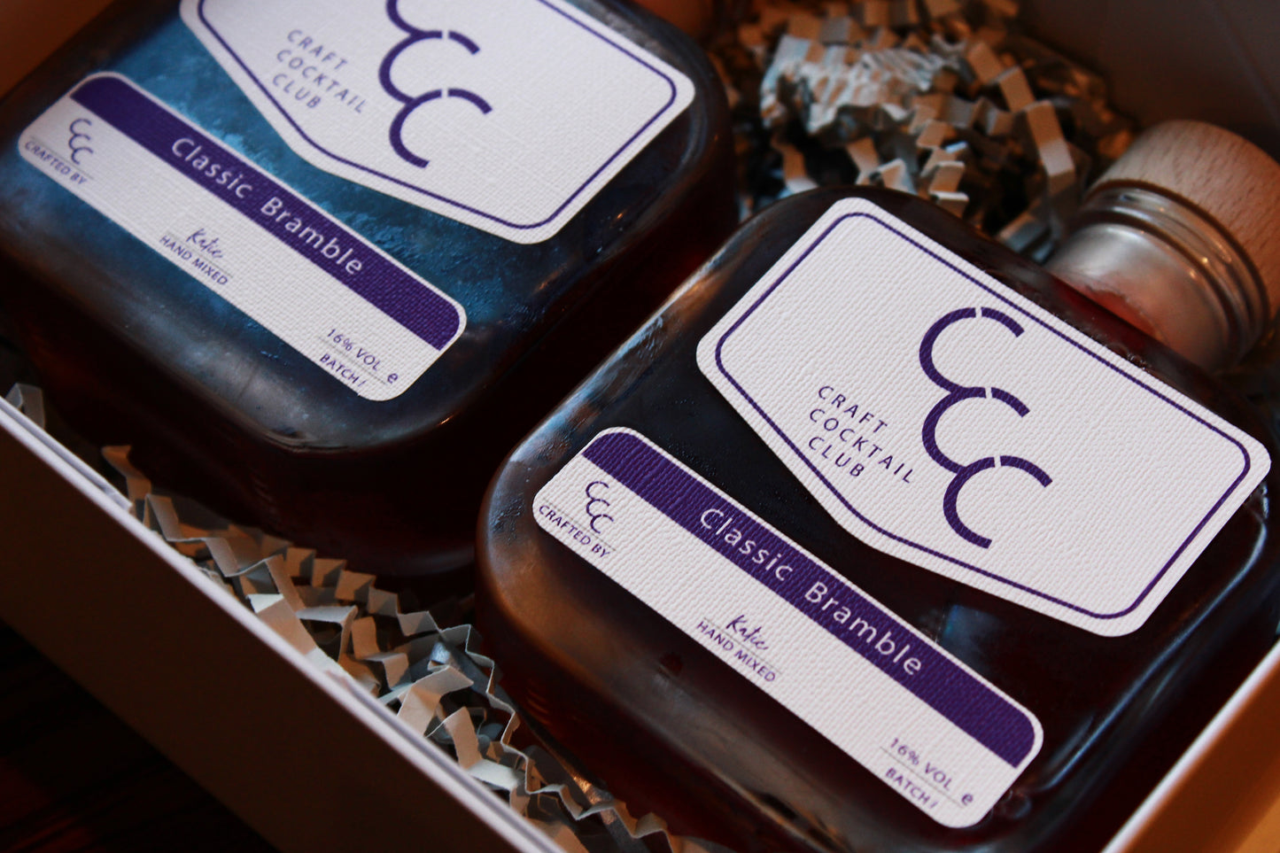 Picture of two bottles of purple cocktail in a gift set, bottles say Classic Bramble Craft Cocktail Club