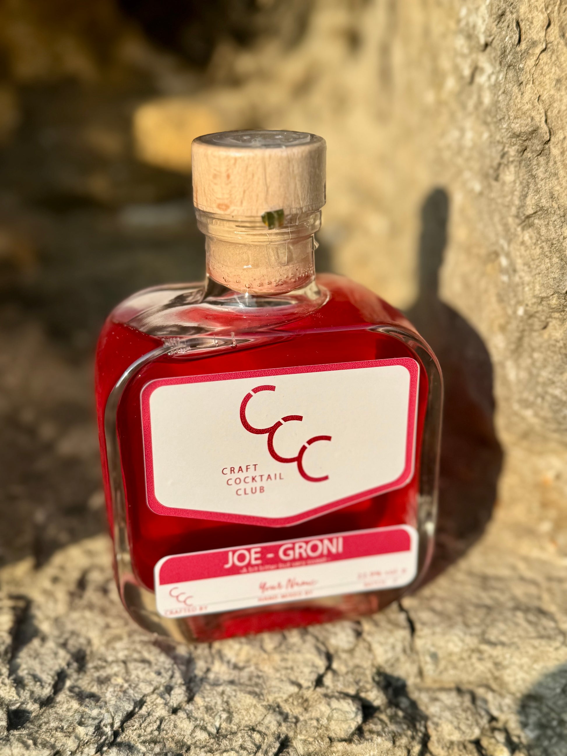 Bottle of Joe Groni  Negroni Cocktail, in a square glass bottle, the label has been customised to include the recipients name on it and reads Joe - Groni